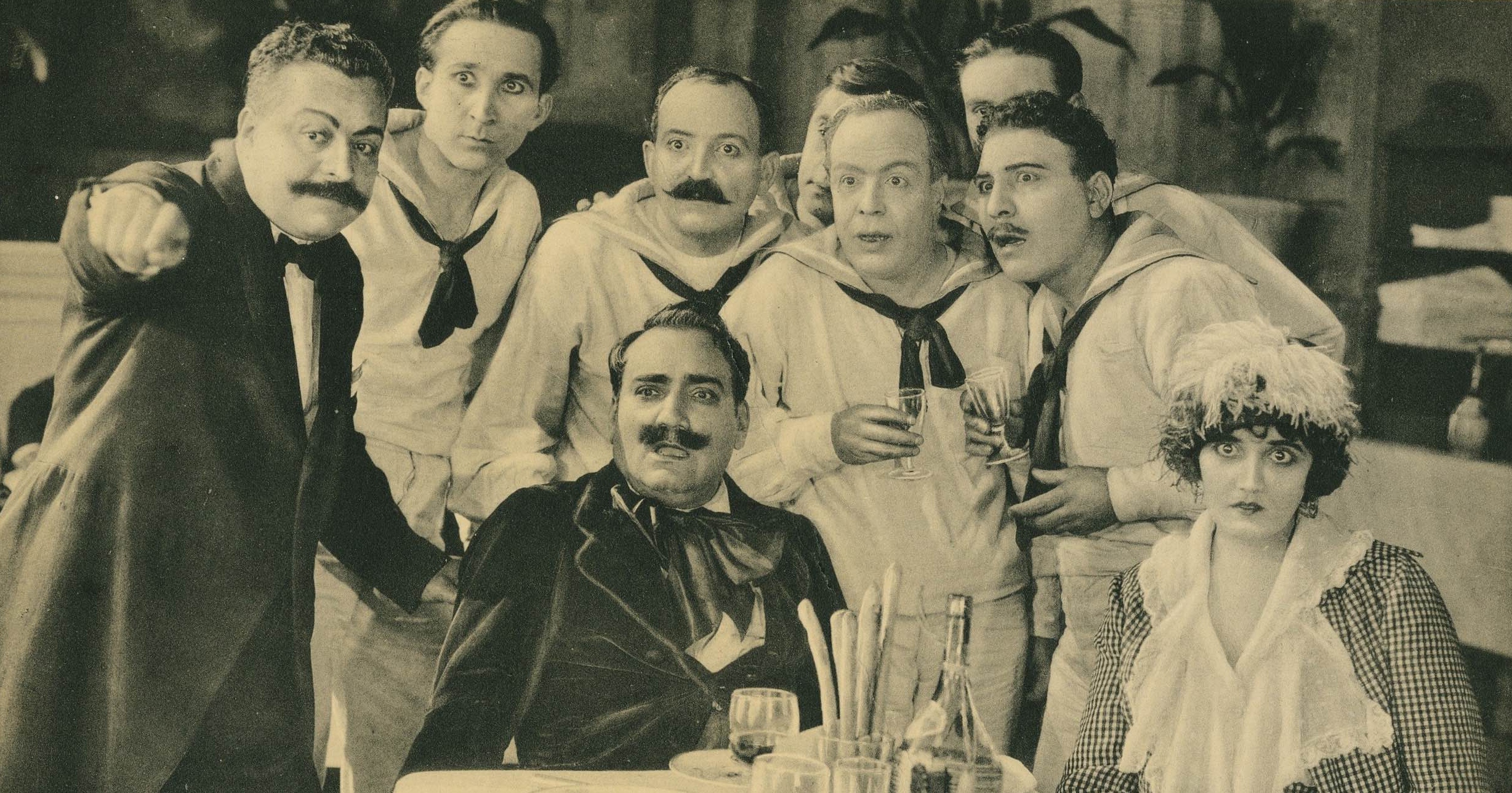 My cousin, lobbycard, Enrico C​aruso (sitting, center), 1918